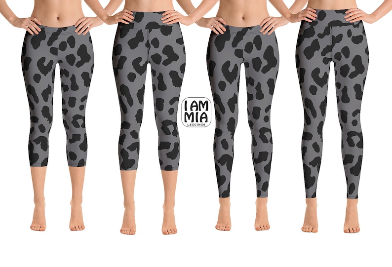 May include: Gray leggings with a black leopard print pattern. The leggings are high-waisted and reach to the ankles. The brand name "I AM MIA LEGGINS" is printed on the leggings.