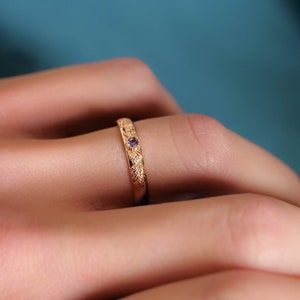 rose gold wedding ring with alexandrite and diamonds