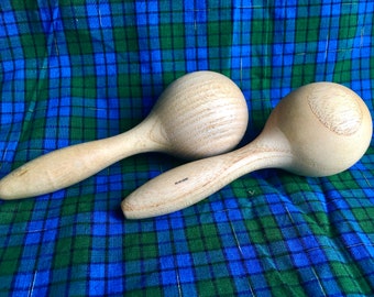 two wooden hand rattles, musical instrument, Portuguese handcraft