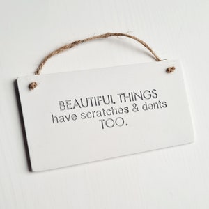 Beautiful things have scratches and dents too - handmade clay sign