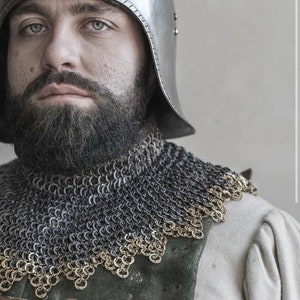 Gorget chainmail flat riveted rings padded with white gambeson inside.