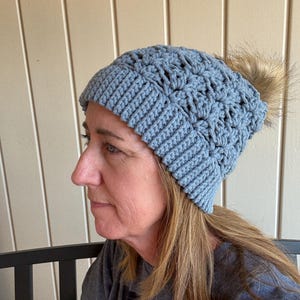 Adult country blue Crocheted winter hat with brown Faux Pom