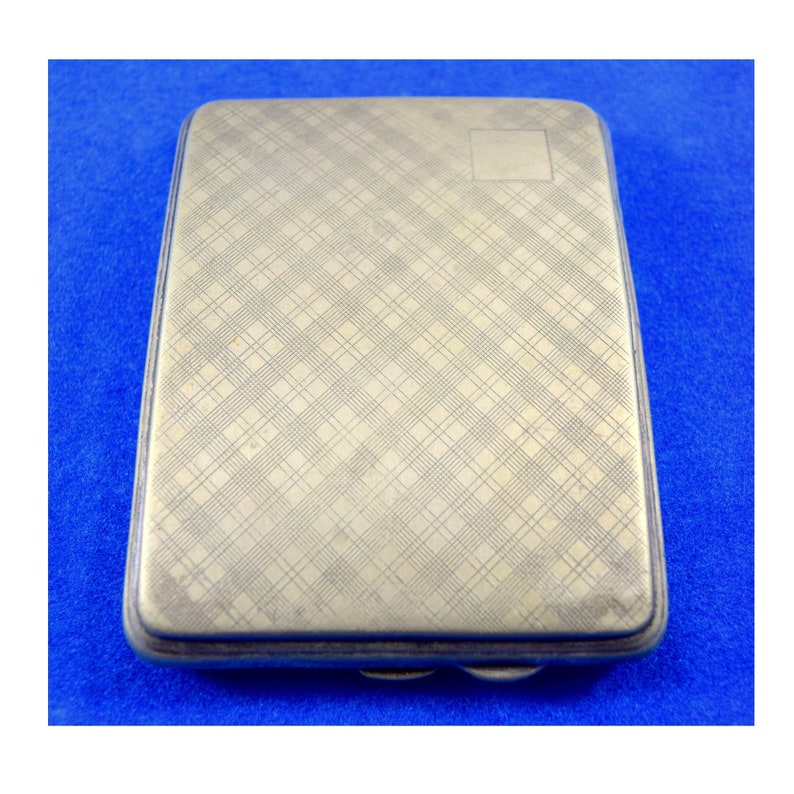 epns cigarette case Sold at Auction: A George V silver plated E.P.N.S. rectangular case, enamel mount to cover, British Empire Exhibition Wembley 1924, 8cm x 6.5cm With an interior space of 3.5in x 2.25in x .8in Epns cigarette case art -