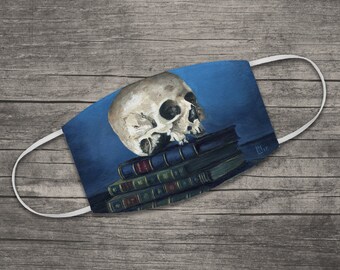 Skull on Books Reusable Fabric Face Mask, Machine Washable, Elastic Ear Loops, One size: 7.25" x 4.63"