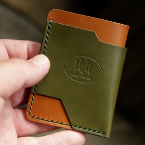 La cartera de bolsillo delantero de Ocelot