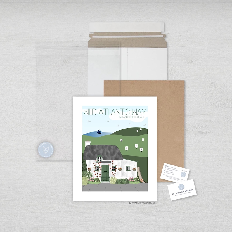 May include: A white cottage with a thatched roof and green door, set against a green hillside with white sheep. The text "Wild Atlantic Way, Ireland's West Coast" is at the top of the image.