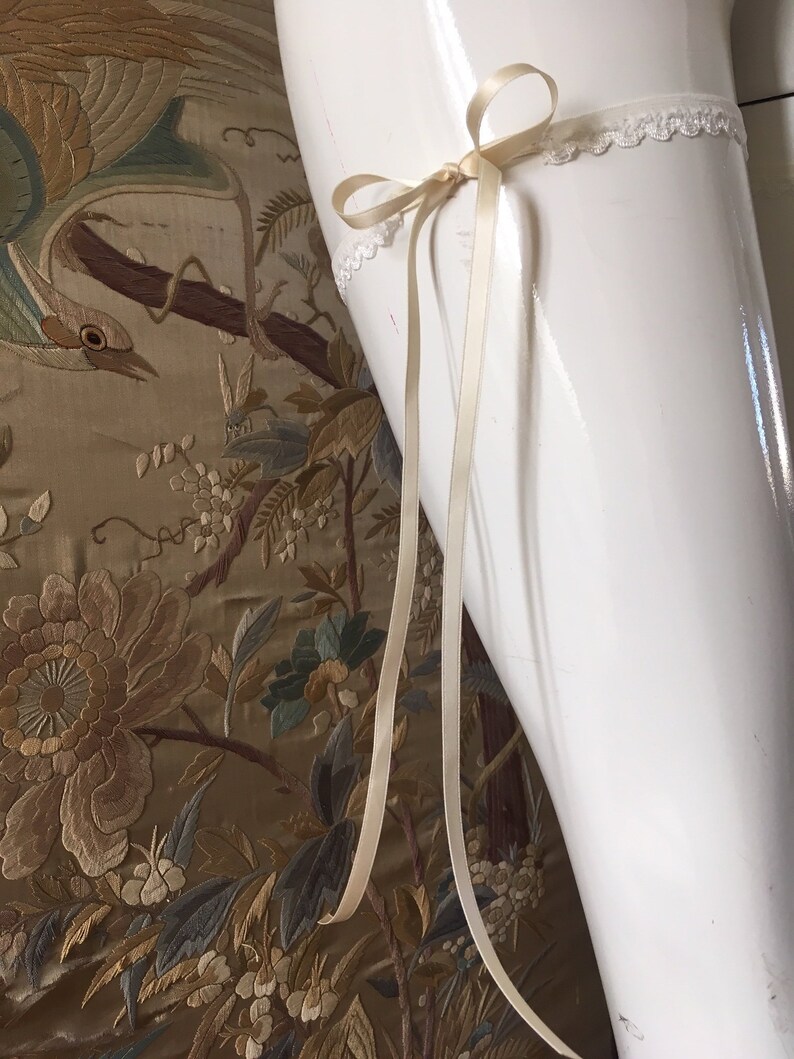 Beautiful elegant wedding garter with long ribbons