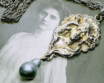 Vintage Art Nouveau silver necklace with a woman's head pendant with peacock and roses and pearl teardrop