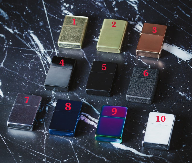 May include: Ten different lighters in various colors and finishes, numbered 1 through 10. The lighters are arranged in two rows of five.
