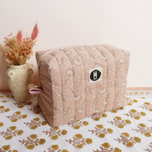 Old pink floral quilted toiletry bag
