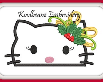 Kitty Christmas peeker. Design in both fill and applique in 5x7 6x10 embroidery digital file