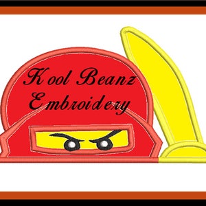 May include: Embroidered design featuring a red ninja helmet with yellow accents and the text "Kool Beanz Embroidery." The design includes a yellow blade and a black and orange border.