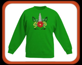 Unicorn peeker with Christmas flower. I both fill and applique  designs.In sizes 4x4 5x7