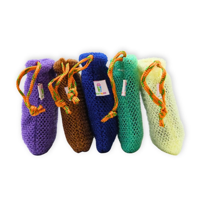 May include: Five colorful mesh bags in purple, brown, blue, green, and yellow. Each bag has a drawstring closure with an orange and green cord. Small white tags are attached to the bags. The bags are arranged in a row against a white background.