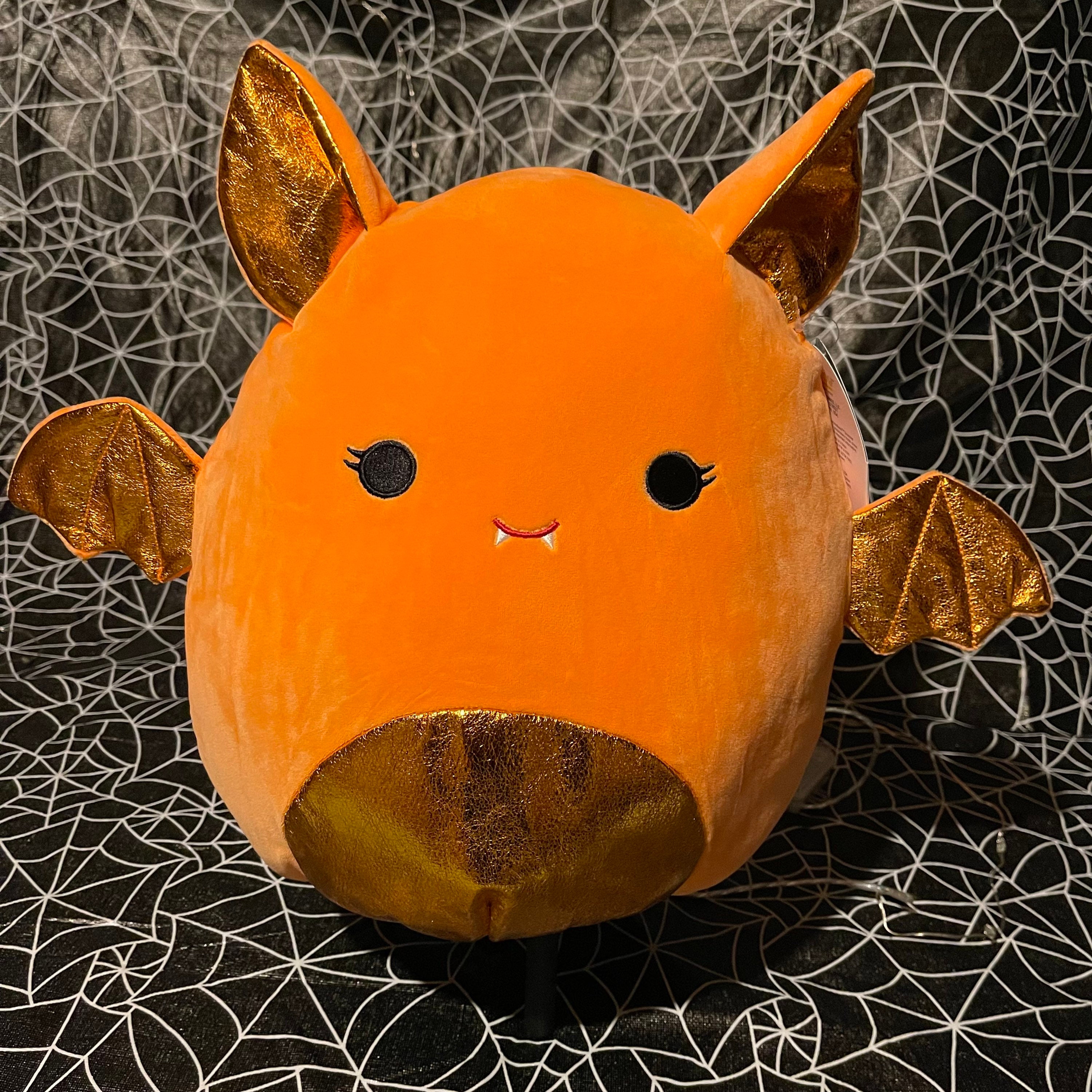 orange squishmallow bat