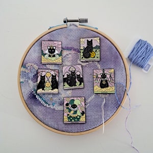 Tarot cards cat needle minders