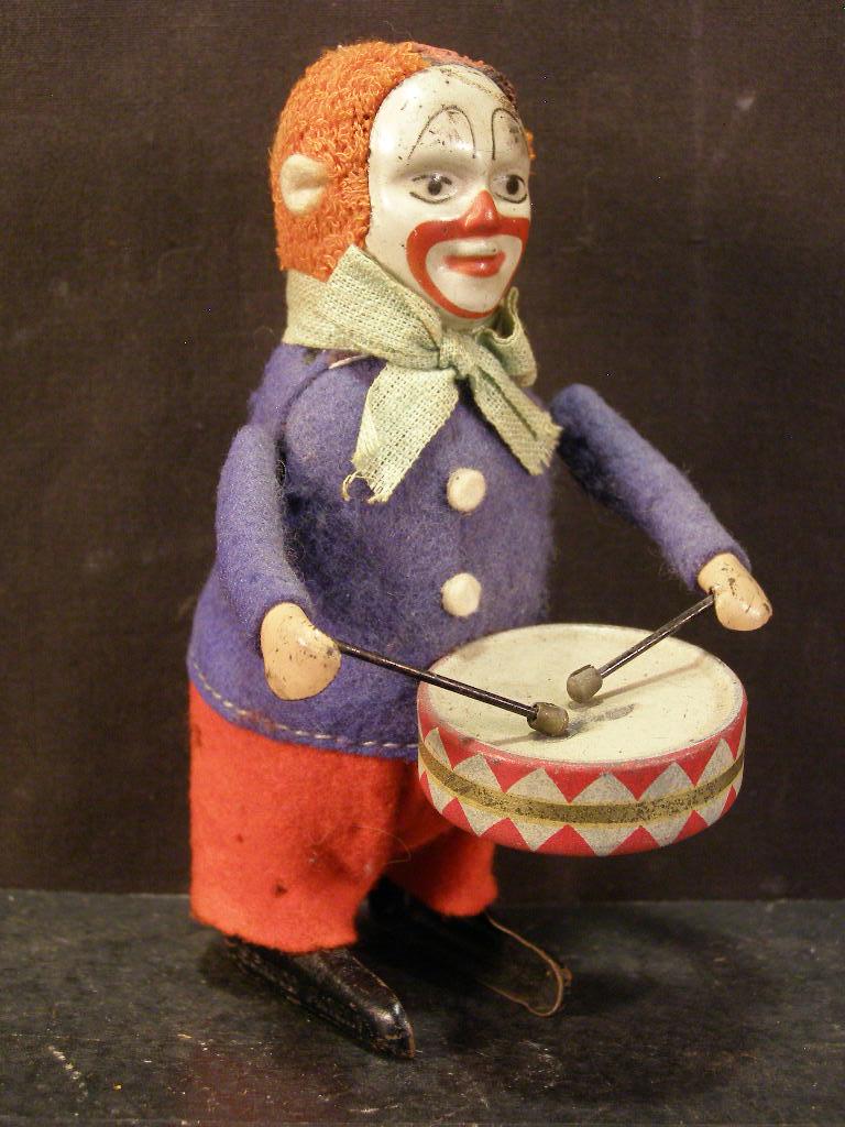Anciens jouets mécaniques lapin et clown musicien Schuco - Collection
