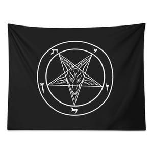 May include: Black tapestry featuring a white pentagram with a goat-like head inside a circle. The pentagram is a five-pointed star, and the goat head has horns and a beard. The tapestry is rectangular and hangs against a black background.