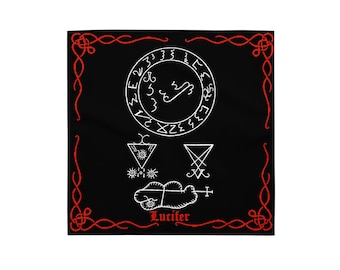 May include: Black square textile with a red border featuring white occult symbols and text. The design includes a central circular emblem, triangles, and the word "Lucifer" in red script at the bottom.