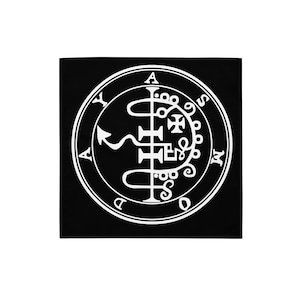 May include: Black square bandana with a white sigil design. The sigil is circular, containing symbols and text, including the letters A, Y, S, M, and D. The design is centered on the bandana.