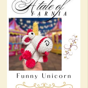 May include: A handmade white and red crochet unicorn with a yellow horn. The unicorn has a smiling face and is labeled "Funny Unicorn" with the text "A Tale of Yarnia" above it.
