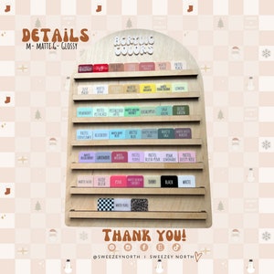 May include: A wooden display board showcasing acrylic color options. The board features various color swatches labeled with names like "Burgundy," "Pastel Pink," and "Black." The text "Acrylic Colors" and "Details" are visible. The bottom of the board says "Thank You!"