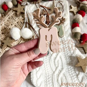 matte nude initial with matte brown reindeer antler personalized stocking tag