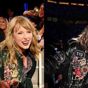 May include: A person wearing a dark green sequined jacket with embroidered floral and crown details. The jacket has patches that read "Reputation Stadium Tour" and "Rep". The person is smiling and appears to be at a concert.