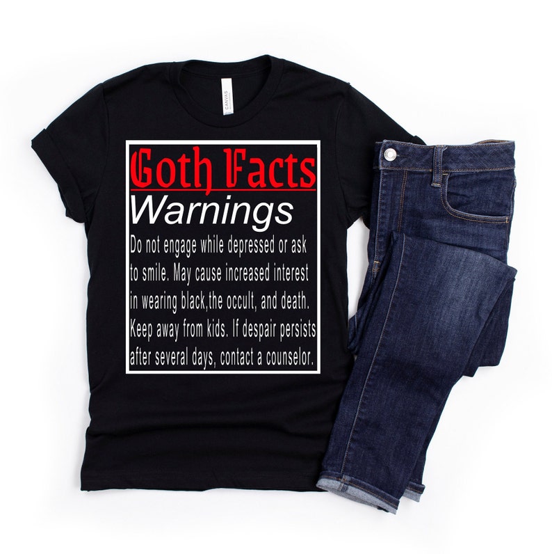 May include: Black t-shirt with white text that reads "Goth Facts Warnings" and includes a list of warnings about goth culture. The text is in a box with a black outline.