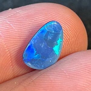 Boulder opal doublet freeform 1.65 carats 8x11 mm.