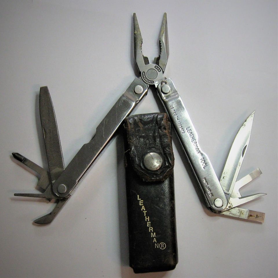 Leatherman Tool US Reg TM 1325473 With Leather Case 0193 0393