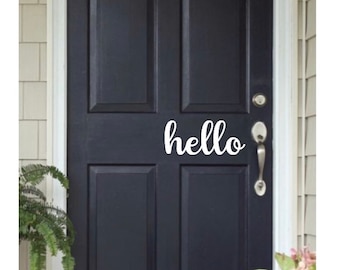 Letrero de vinilo para puerta con texto "Hola y adiós"