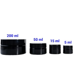 May include: Four black glass jars with lids, labeled with their volume in milliliters: 200 ml, 50 ml, 15 ml, and 5 ml.