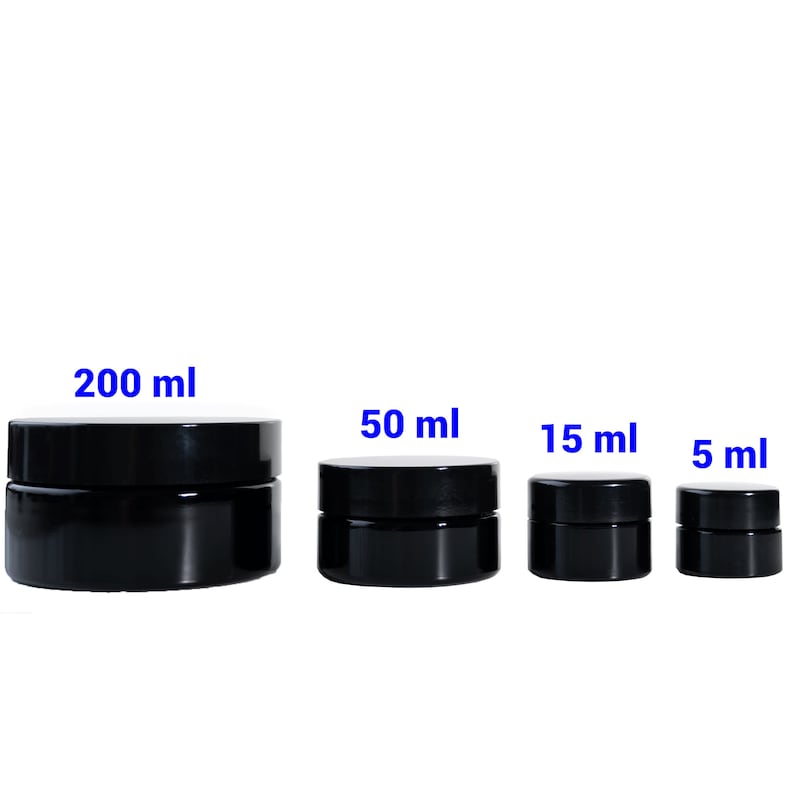 May include: Four black glass jars with lids, labeled with their volume in milliliters: 200 ml, 50 ml, 15 ml, and 5 ml.