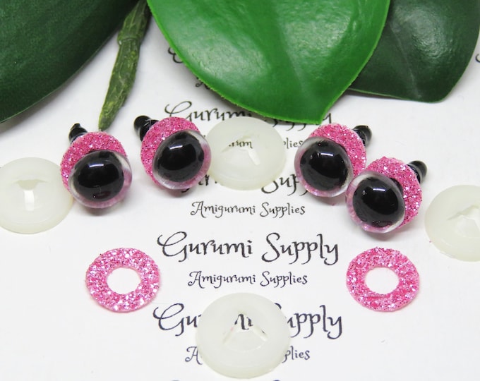 10mm Clear Round Plastic Safety Eyes with a Pink Glitter Non-Woven Slip Iris and Washers: 2 Pairs - Dolls / Amigurumi / Animal / Crochet