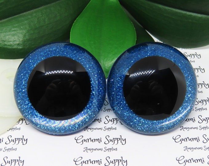 50mm Clear Round Safety Eyes with Blue Glitter Non-Woven Slip Iris, Black Pupil and Washers: 1 Pair - Dolls / Amigurumi / Animal / Crochet