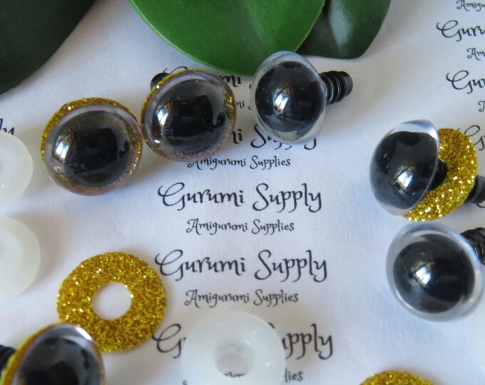 16mm Clear Round Safety Eyes with a Gold Glitter Non-Woven Slip Iris, Black Pupil and Washers: 1 Pair - Dolls/Amigurumi/Animals/Crochet/Knit