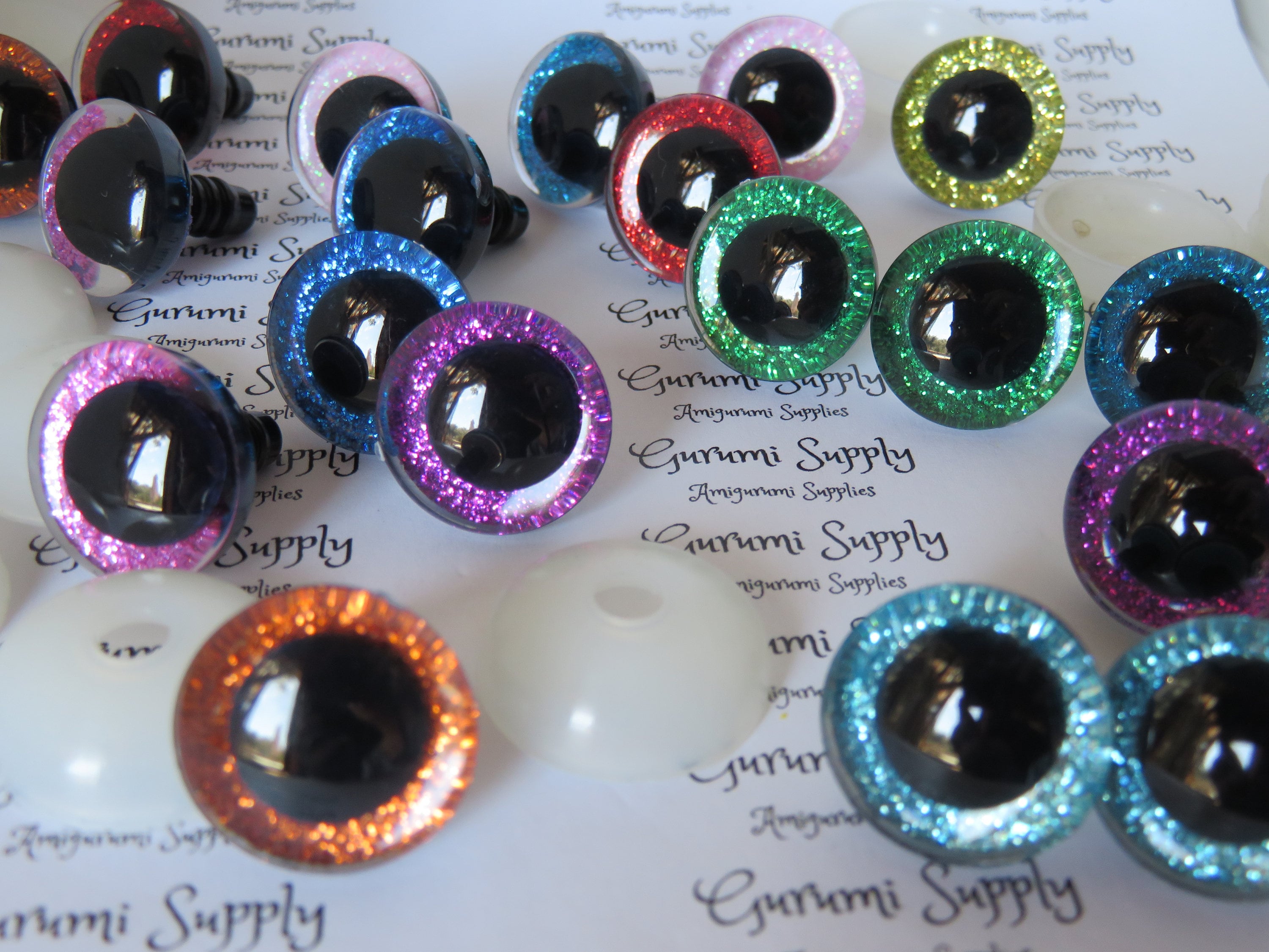 20mm Clear Trapezoid Plastic Safety Eyes with a Blue Glitter NonWoven