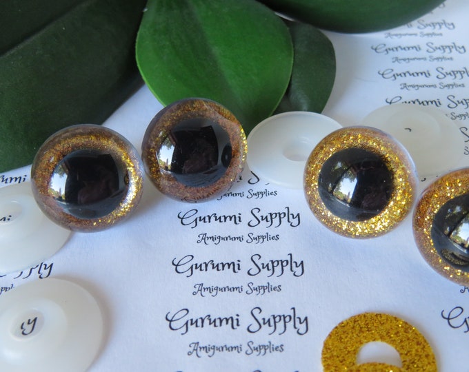 24mm Clear Round Safety Eyes with a Gold Glitter Non-Woven Slip Iris, Black Pupil and Washers:  1 Pair - Doll / Amigurumi / Animal / Crochet