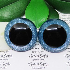 50 mm klare runde Sicherheitsaugen mit hellblauer Glitzervlies Slip Iris, schwarz Pupill und Unterlegscheiben: 1 Paar - Puppen / Amigurumi / Tier / Spielzeug