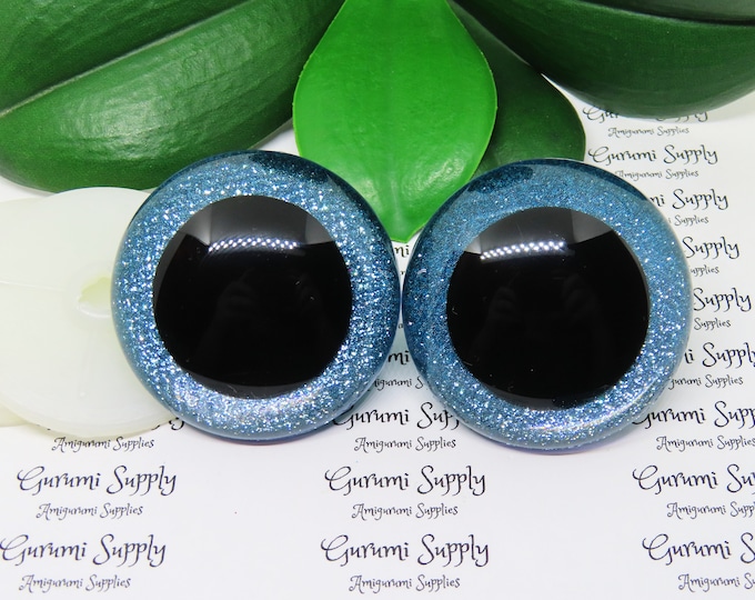 50mm Clear Round Safety Eyes with Light Blue Glitter Non-Woven Slip Iris, Black Pupil and Washers: 1 Pair - Dolls / Amigurumi / Animal / Toy