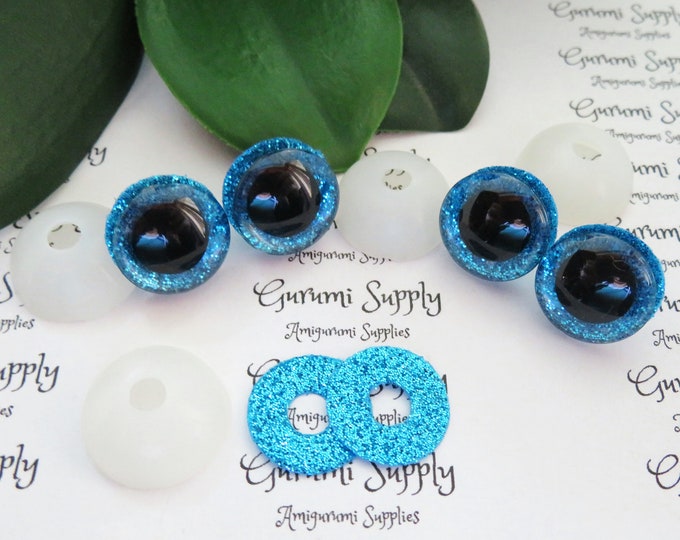 16mm Clear Trapezoid Safety Eyes with a Blue Glitter Non-Woven Slip Iris, Black Iris and Washers: 1 Pair - Dolls / Amigurumi / Animal / Toys