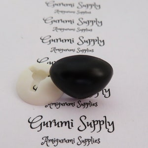 May include: A pair of black safety eyes for amigurumi projects. The eyes are 12mm in diameter and have a white plastic washer.