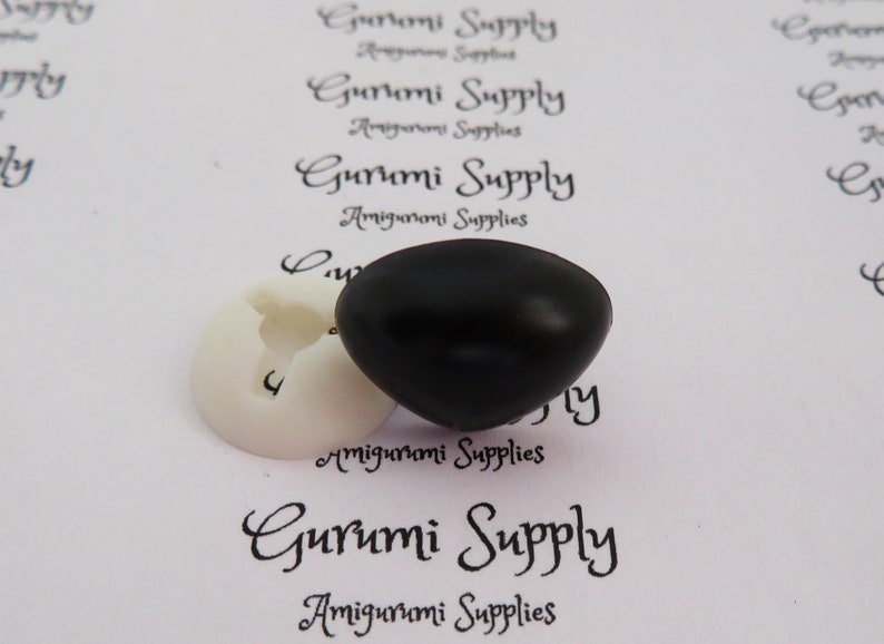 May include: A pair of black safety eyes for amigurumi projects. The eyes are 12mm in diameter and have a white plastic washer.