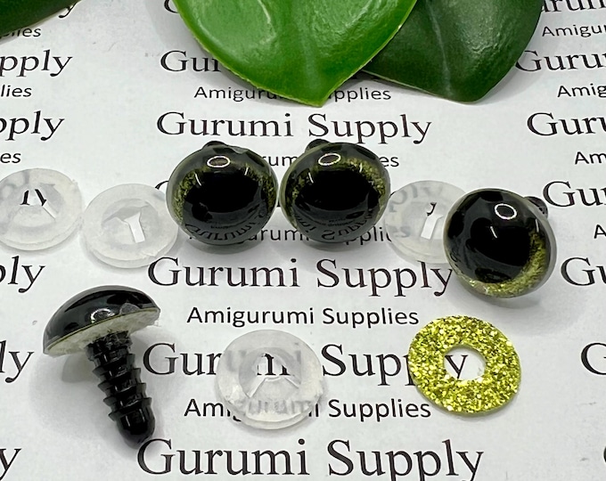 14mm Clear Safety Eyes with Yellow Green Glitter Non-Woven Slip Iris, Black OC Pupil and Washers: 1 Pair - Amigurumi / Off Center / Round