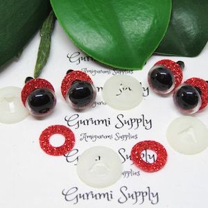 10mm Clear Round Plastic Safety Eyes with a Red Glitter Non-Woven Slip Iris and Washers: 2 Pairs - Dolls / Amigurumi / Animal / Crochet
