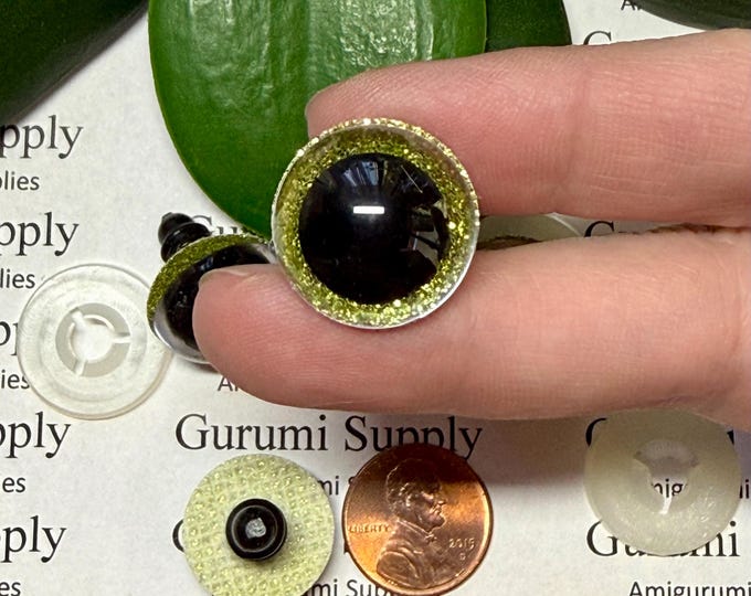 18mm Clear Round Safety Eyes with Yellow-Green Glitter Non-Woven Slip Iris, Black Pupil and Washers: 1 Pair - Doll / Amigurumi / Crochet