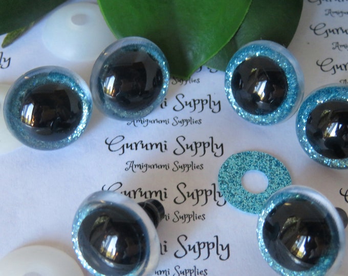 20mm Clear Round Plastic Safety Eyes with Light Blue Glitter Non-Woven Slip Iris, Black Pupil and Washers: 1 Pair - Amigurumi/Animal/Knit