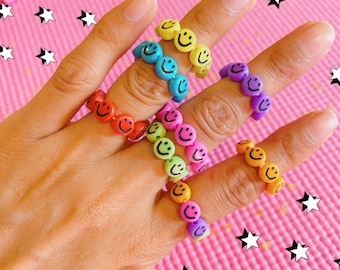 Anillo con cuentas y carita sonriente de colores, para niños y adultos