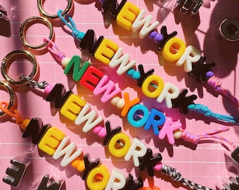 Llavero acrílico personalizado con nombre: Etiqueta personalizada para mochila